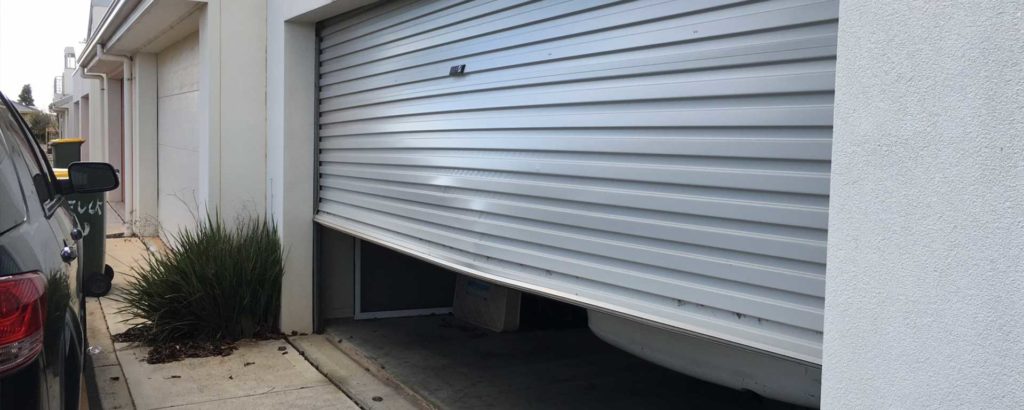 GARAGE DOOR CAR IMPACT